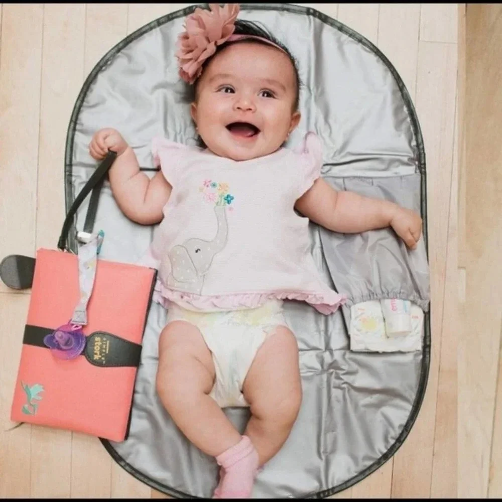 BRAND NEW portable changing pad! Amazing Size!